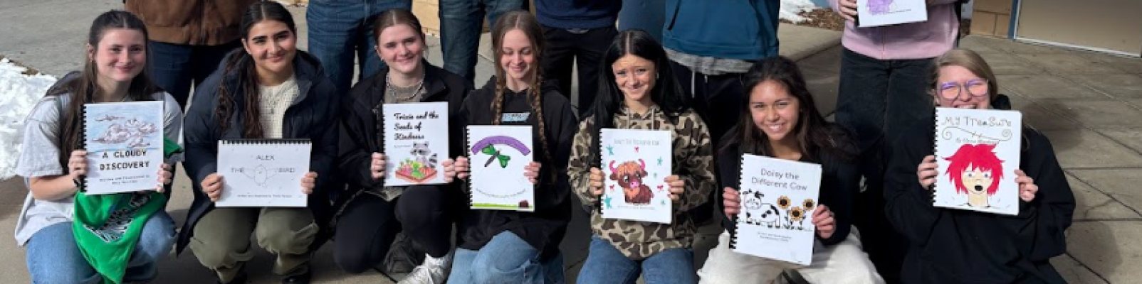 WHS students presented books they wrote to Eyestone Kindergarten class