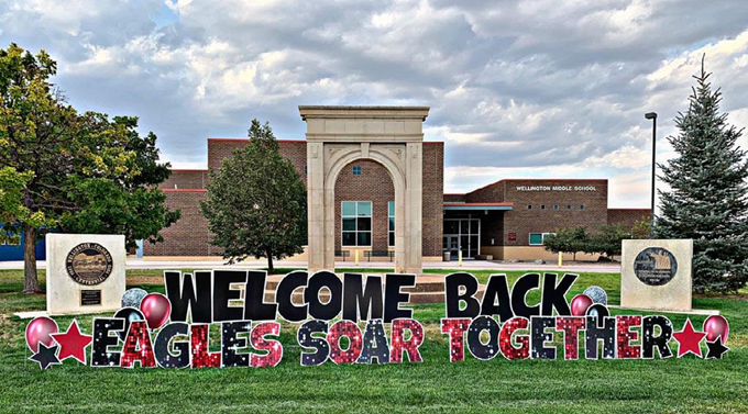 Welcome back banner outside of school